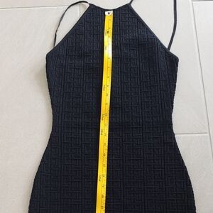 Women black dress mini is new condition in beautiful please see on photo is stre